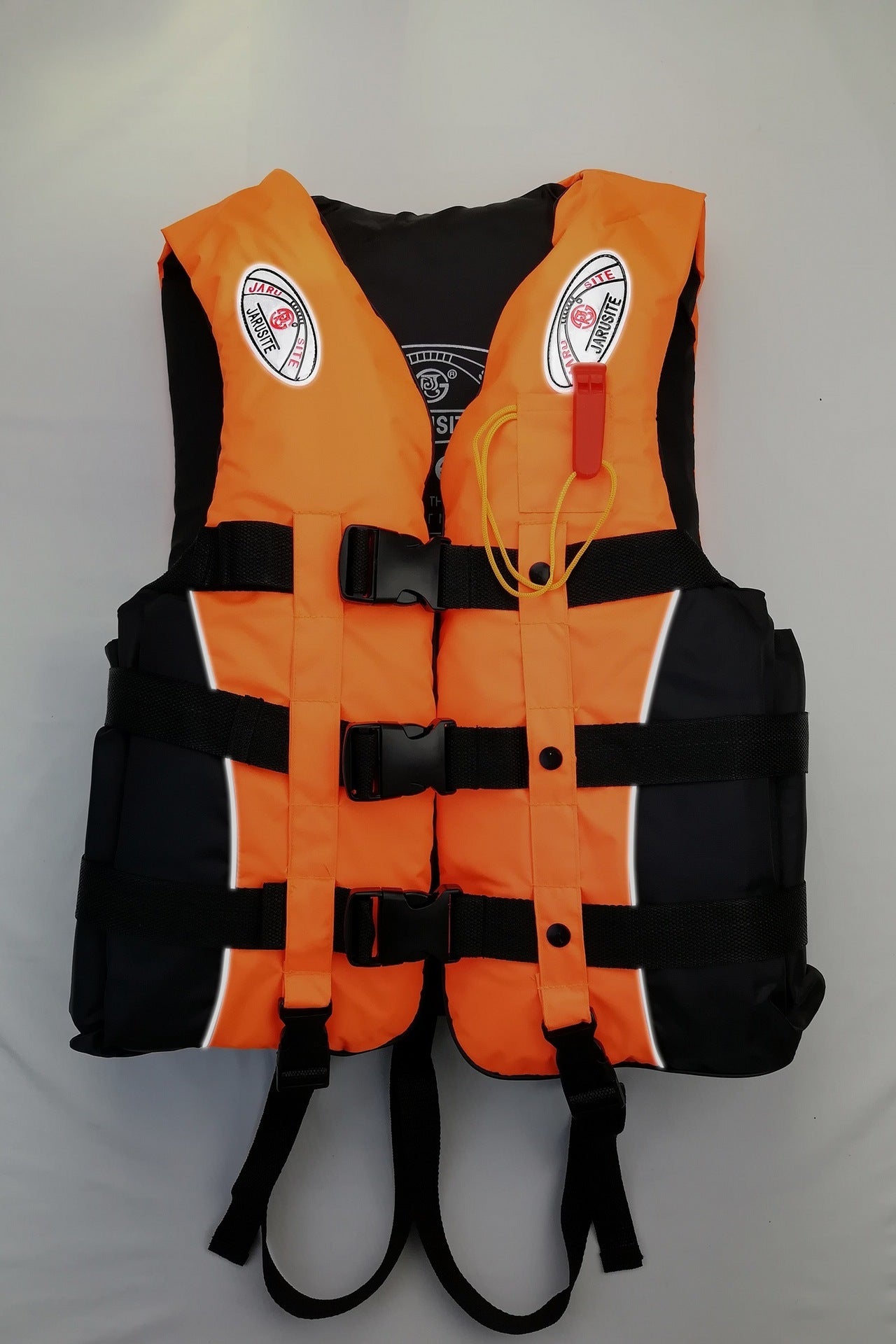 Orange and black life jacket on a white background